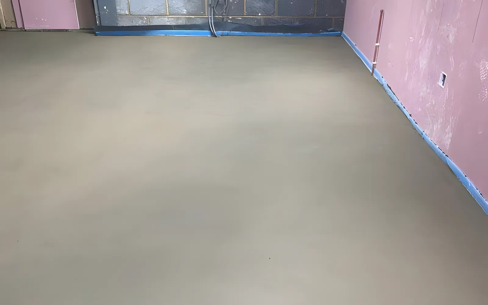 Freshly laid sand and cement floor screed